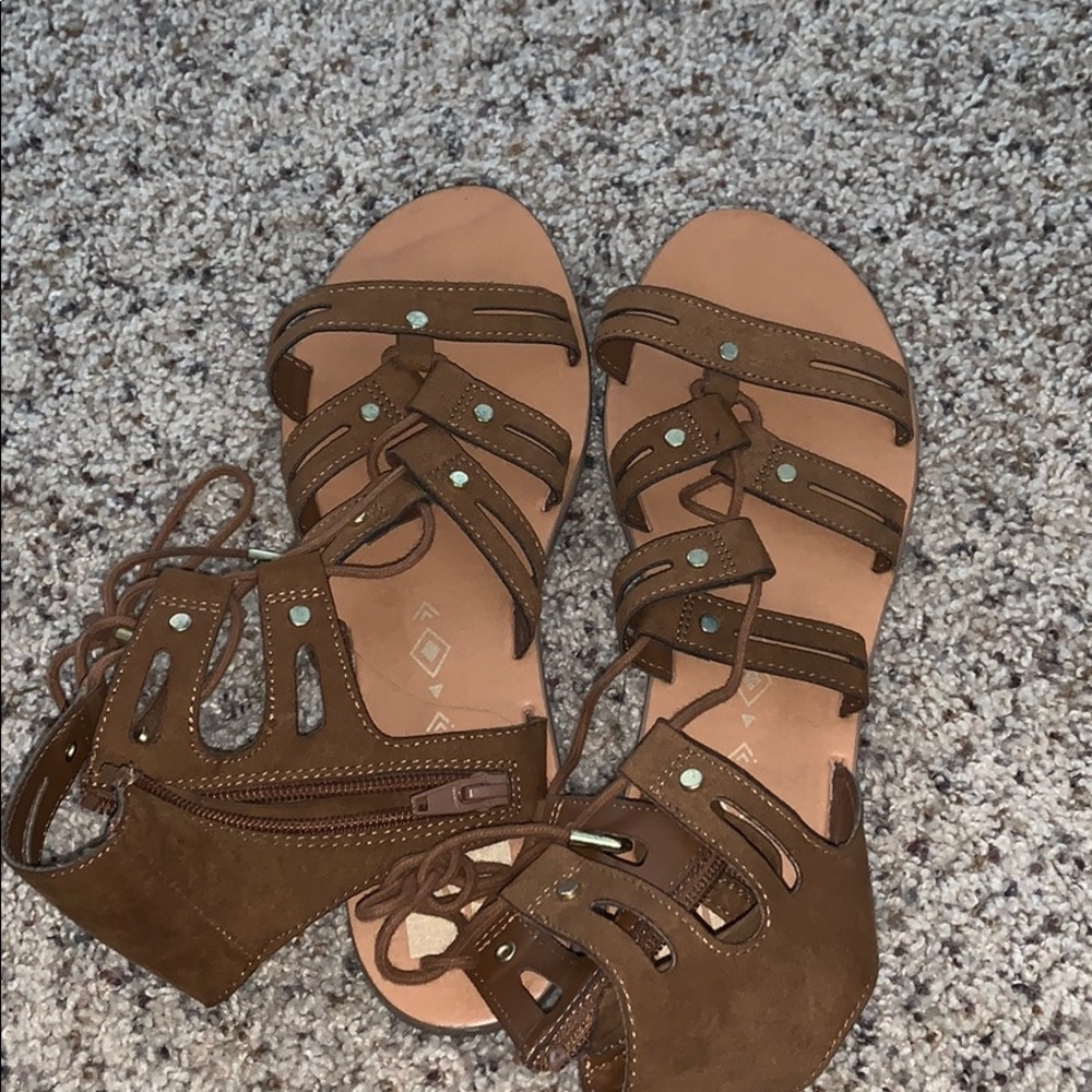 laced brown comfy sandals.